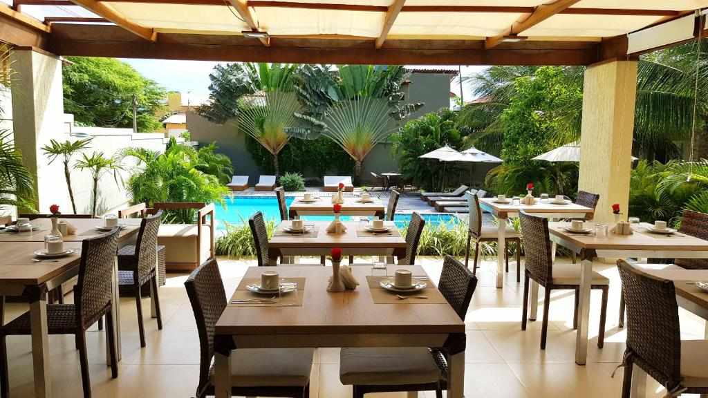 Breakfast terrace facing the pool at Ravenala Hotel Boutique